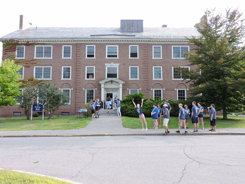 Students eagerly awaiting the arrival of new students to Colvin Hall.