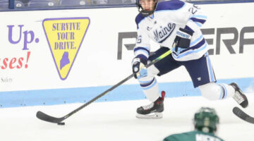Cam Spicer plays ice hockey against Alaska Anchorage in an October 2019 game.
