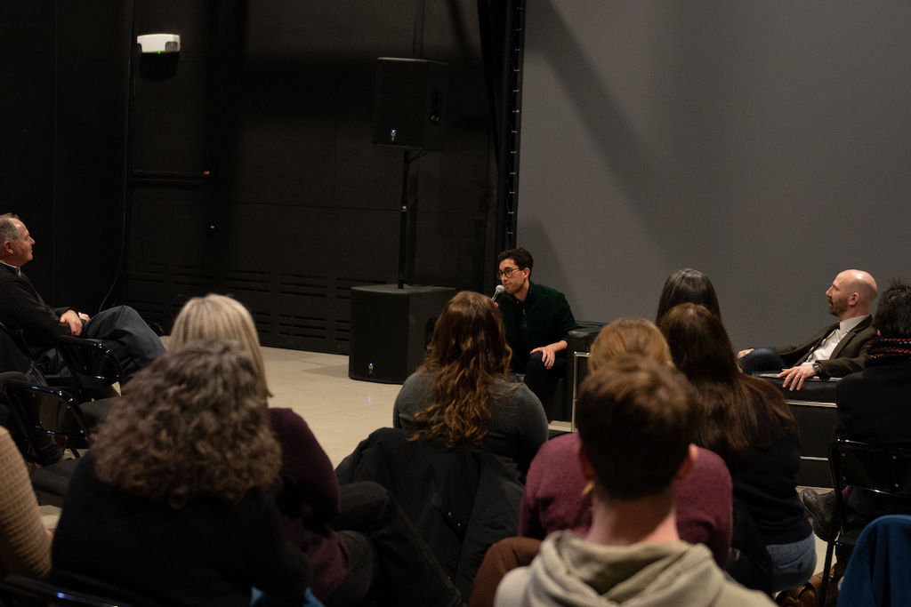 Honors College Alumni Santiago Tijerina presenting his documentary. 