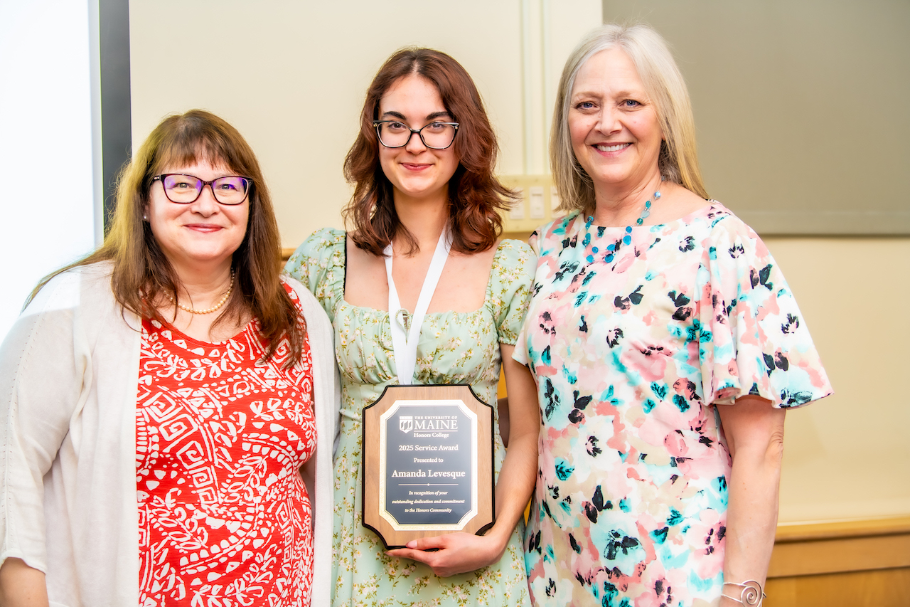 Amanda Levesque with Dean Weinauer and Associate Dean Ladenheim